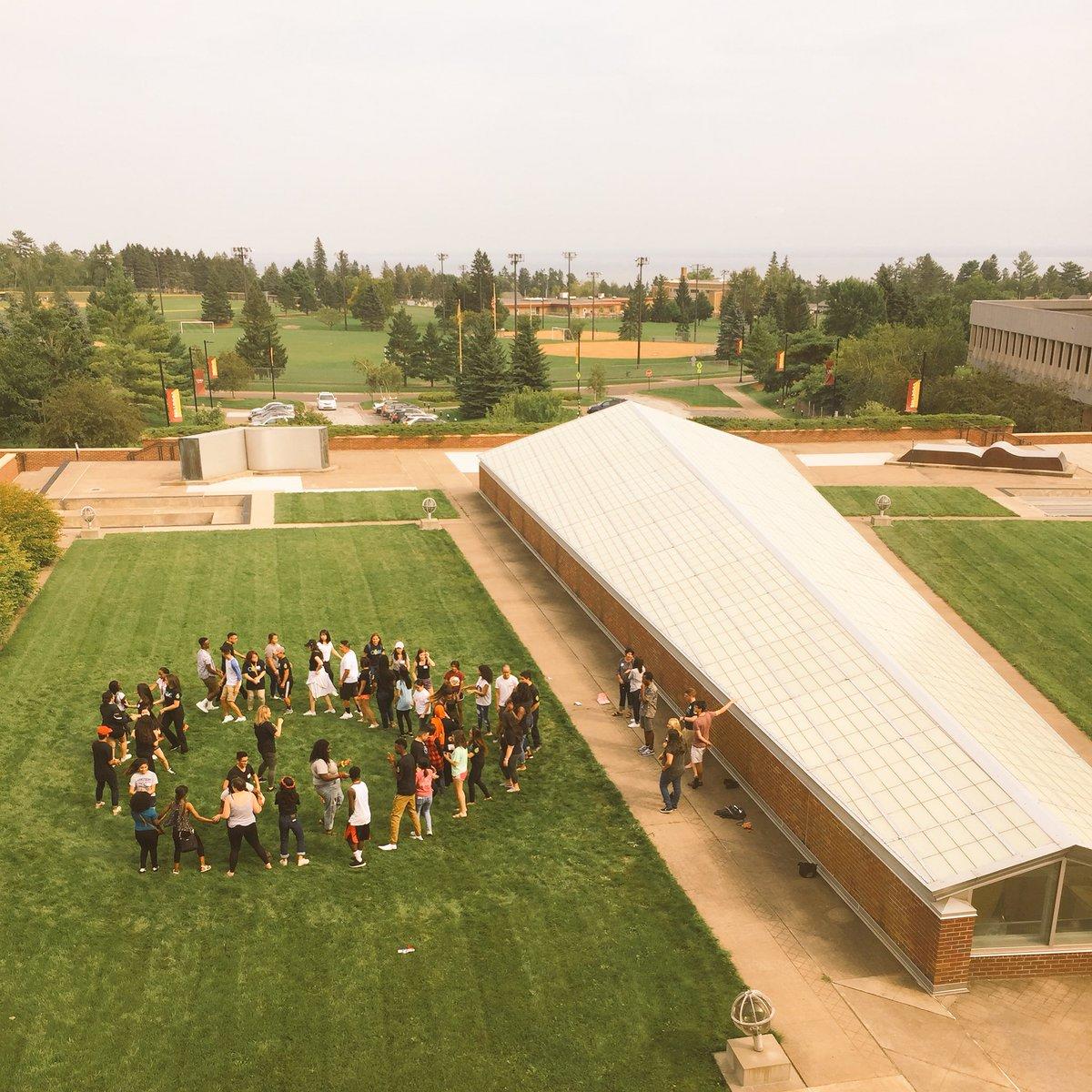 Students forming a human circle on Kirby Terrace.